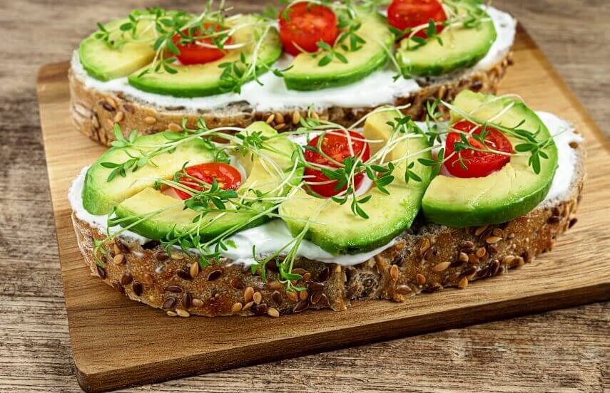 toasts with avocado and microgreens
